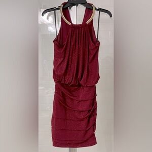 Red halter dress with attached gold necklace